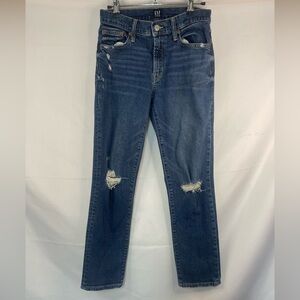 Gap girlfriend fit jeans, medium wash either distressed holes. Size 00